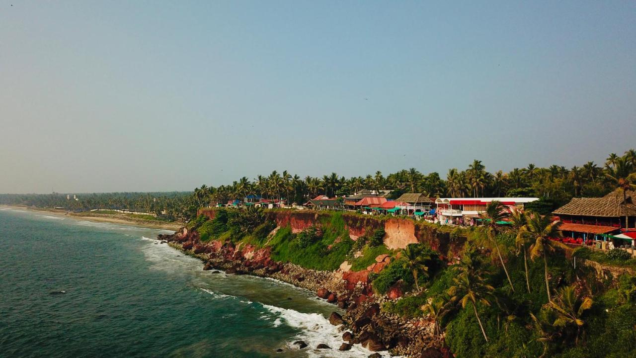 Black Beach Resort Varkala Bagian luar foto