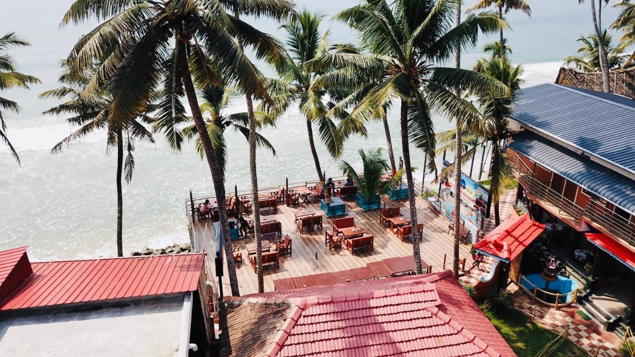 Black Beach Resort Varkala Bagian luar foto