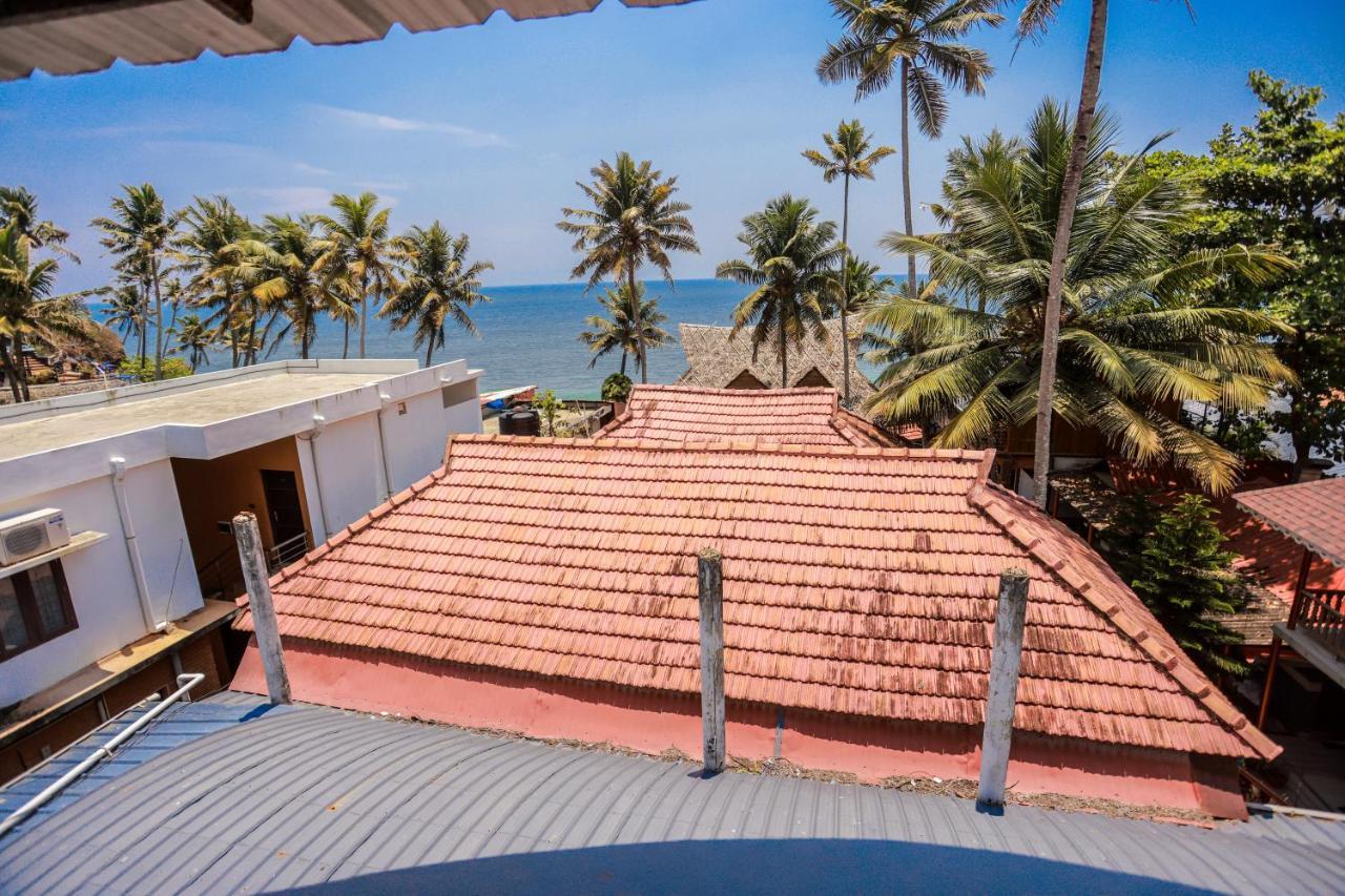 Black Beach Resort Varkala Bagian luar foto