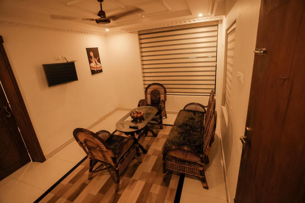 Black Beach Resort Varkala Bagian luar foto