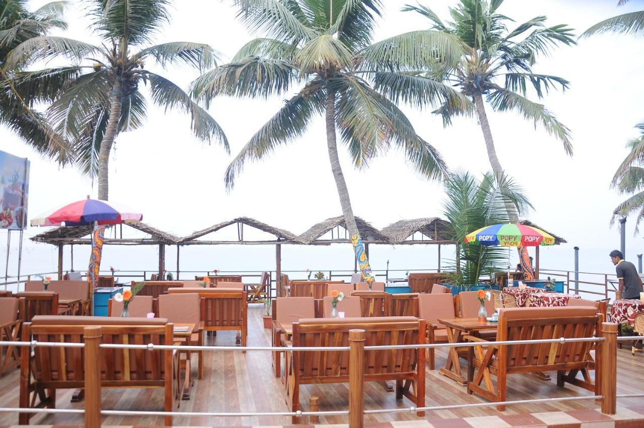 Black Beach Resort Varkala Bagian luar foto