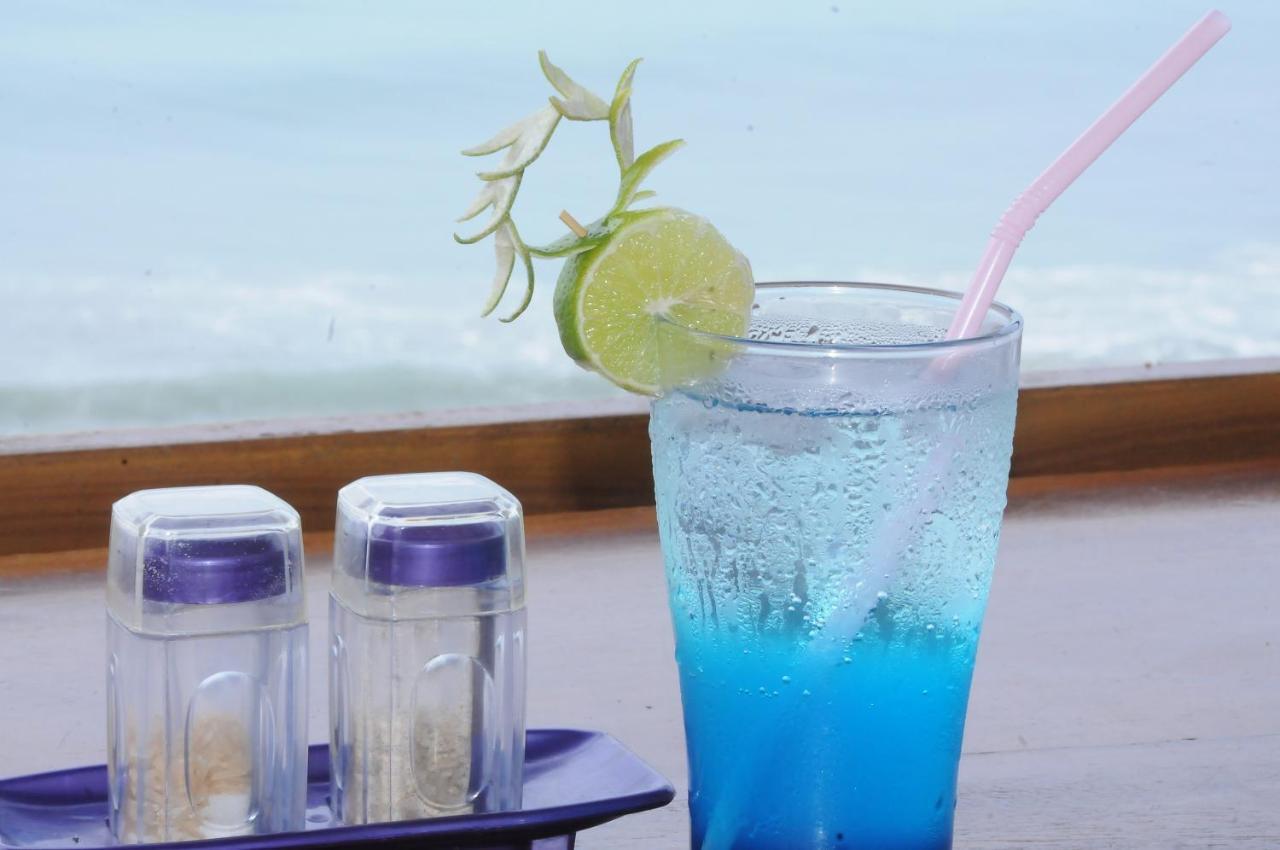 Black Beach Resort Varkala Bagian luar foto
