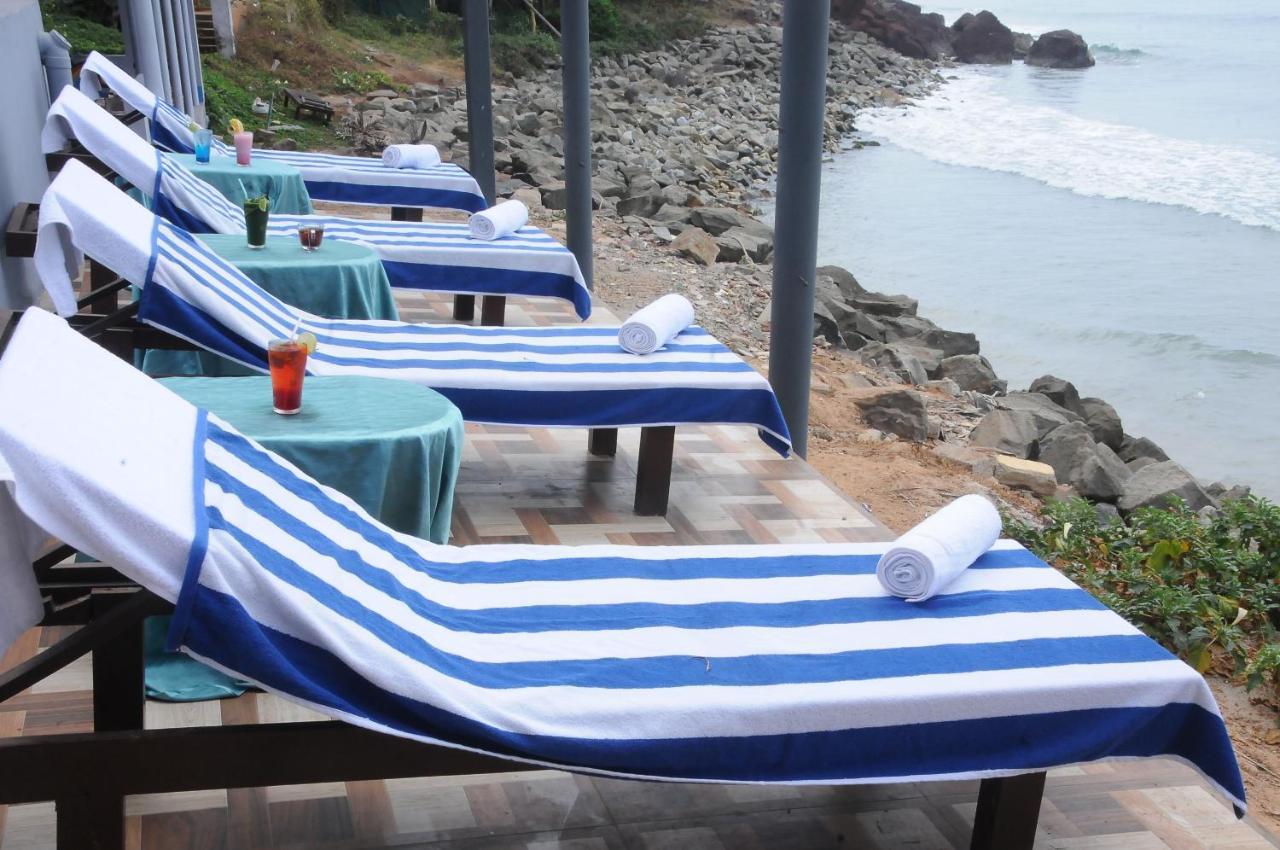 Black Beach Resort Varkala Bagian luar foto