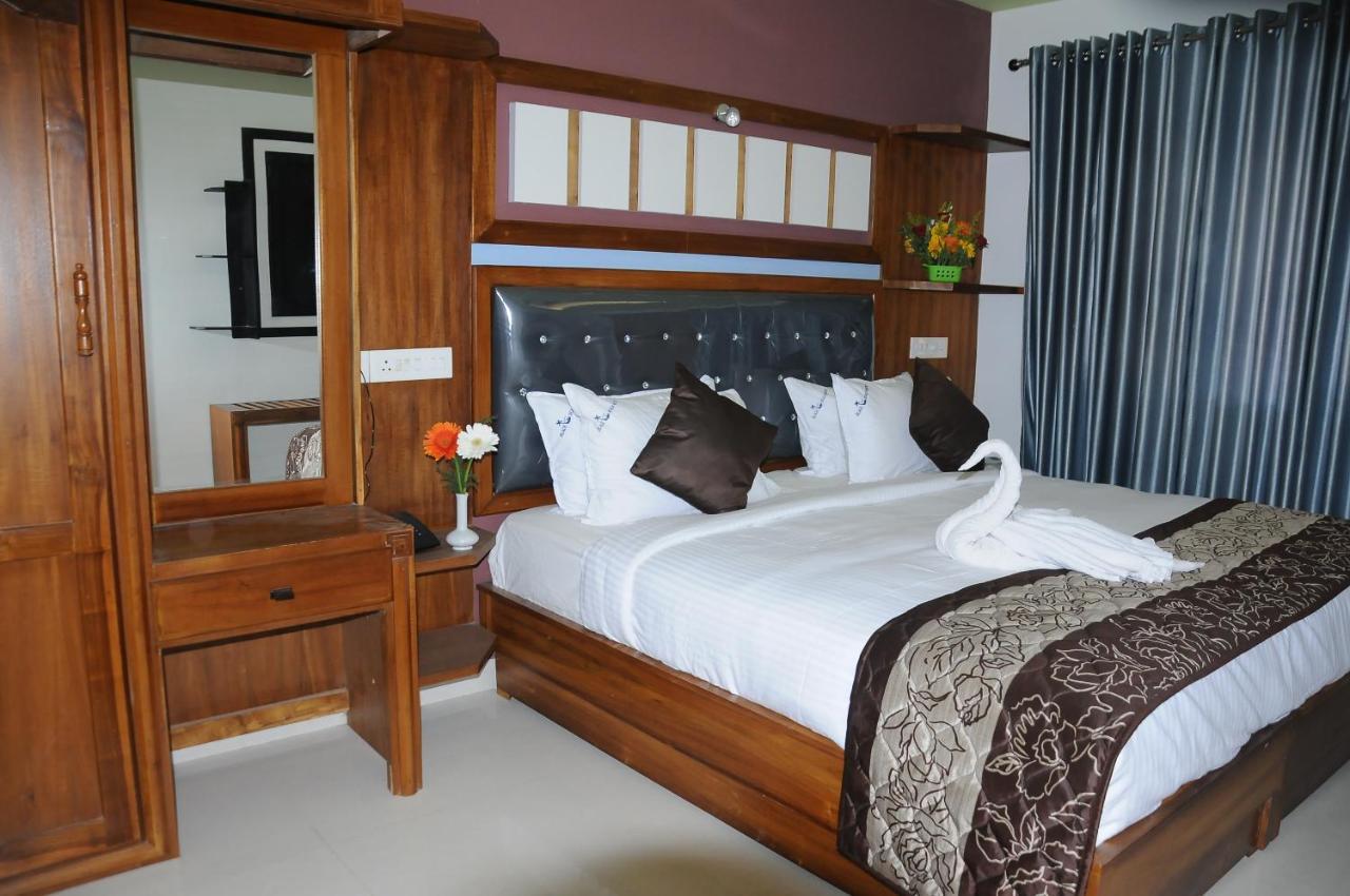 Black Beach Resort Varkala Bagian luar foto