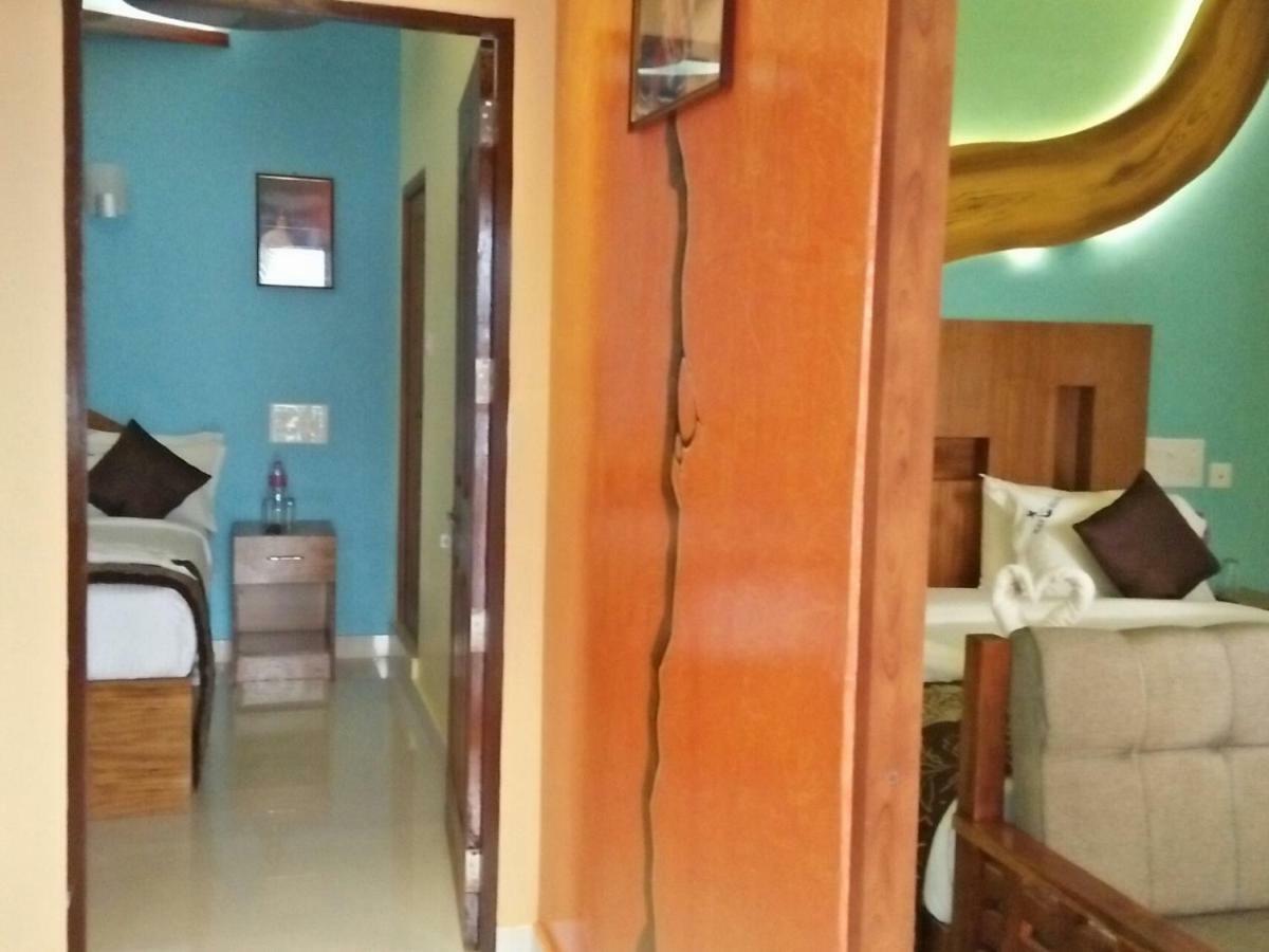 Black Beach Resort Varkala Bagian luar foto
