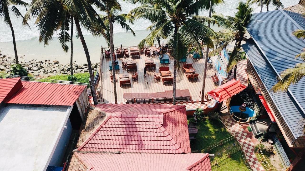 Black Beach Resort Varkala Bagian luar foto