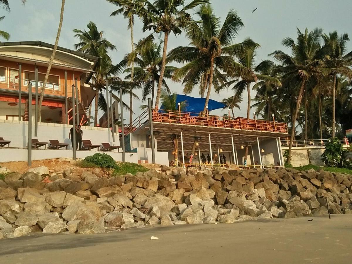 Black Beach Resort Varkala Bagian luar foto